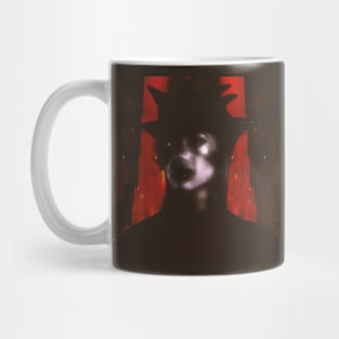 Beautiful girl in strange dark suit, with face mask. Red castle or rock on background. Red, violet, blur. Dark. Mug